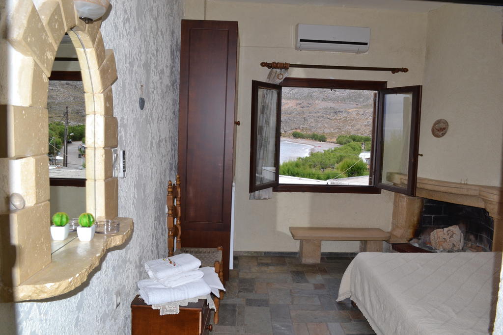 Athena Rooms Zákros Quarto foto